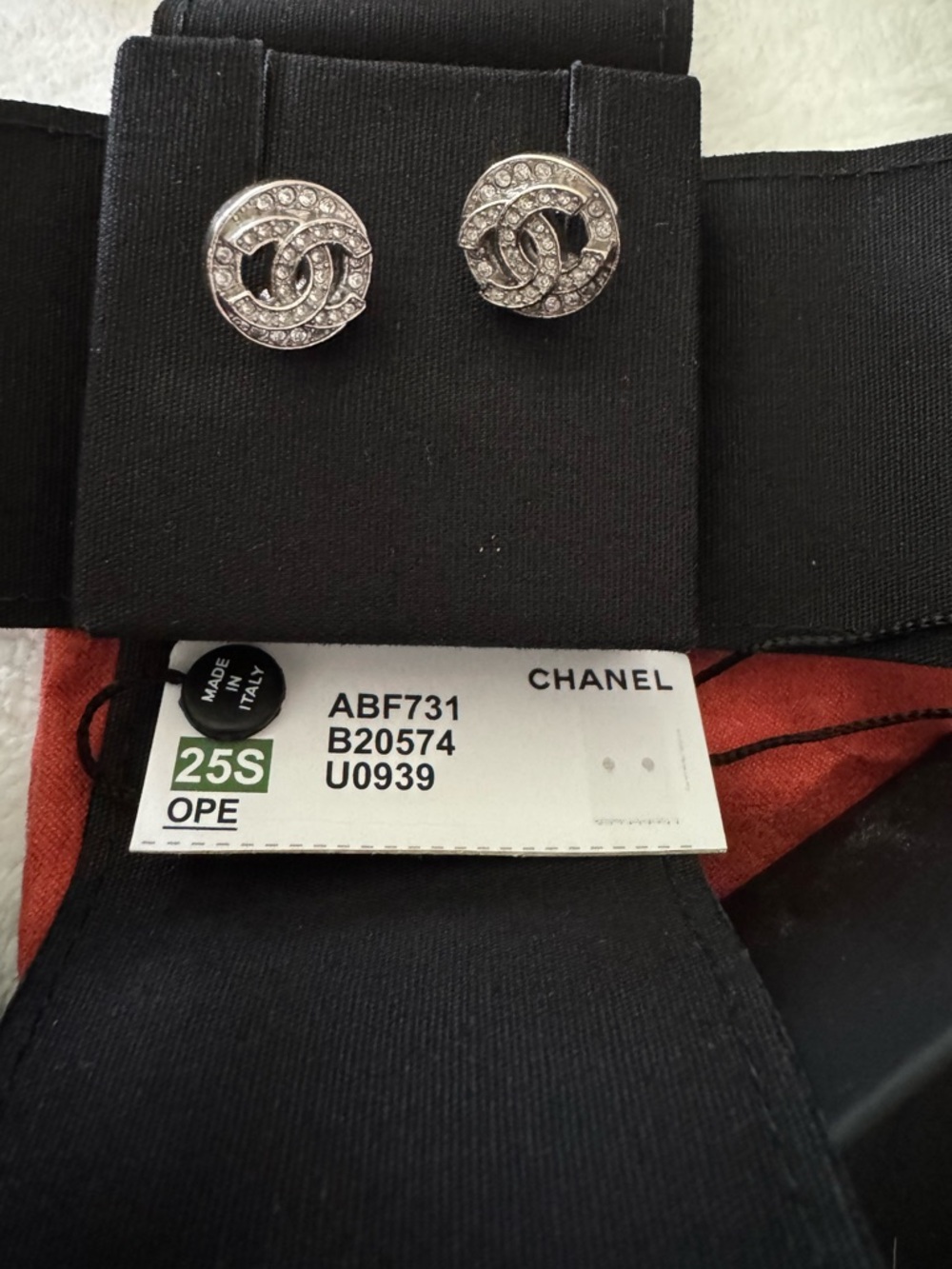 Authentic CHANEL Spring 2025 Silver Crystal CC Logo Stud Earrings
